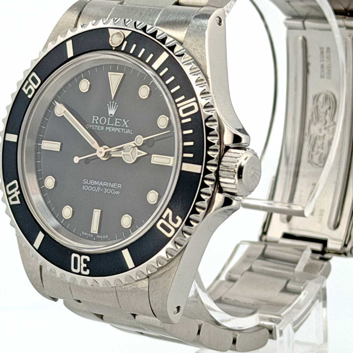 Rolex Submariner 2 lines COSC Four Lines