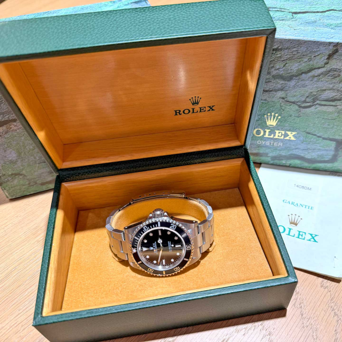 Rolex Submariner 2 lines COSC Four Lines